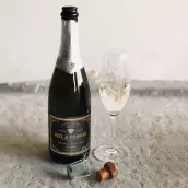 Custom anniversary champagne label, gold elegance on premium black matte paper