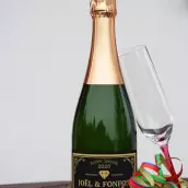 Custom anniversary champagne label, gold elegance on premium black matte paper