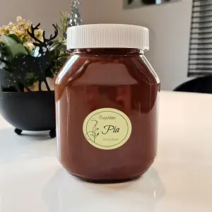 etichetta personalizzata per battesimo rotonda, dal design naturale ed elegante
