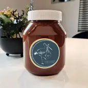 Custom birth label, stork and gentle message, round