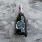 Étiquette personnalisée ronde baptême garçon, motif floral raffiné