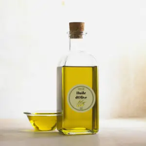 personalized round label for olive oil – vintage design with olive illustration